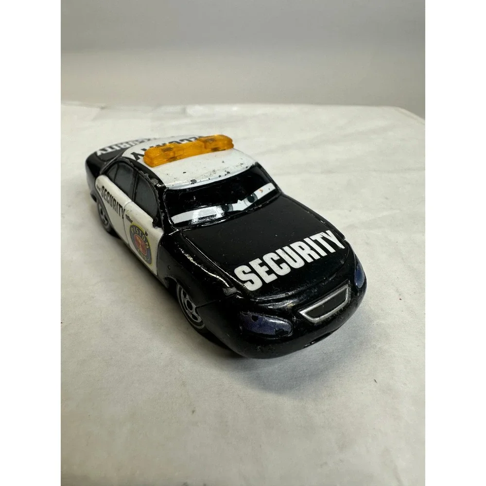 Disney Pixar Cars Marlon Clutches Security Vehicle Black White‎ Piston Cup Toy